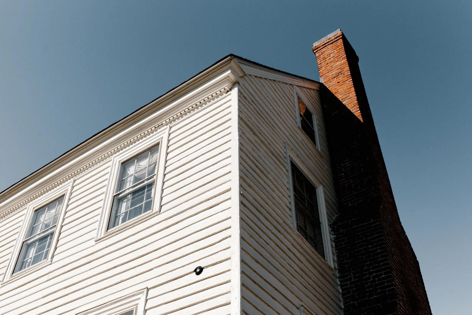 Two-story house with a brick chimney